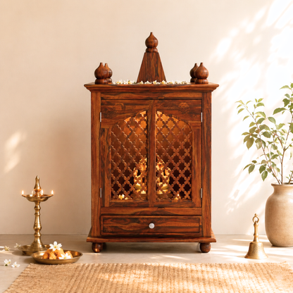 Modern wooden temple for home with carved doors, solid wood finish, storage drawer, and elegant pooja mandir design.