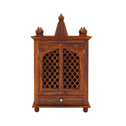 Modern wooden temple for home with carved doors, solid wood finish, storage drawer, and elegant pooja mandir design.